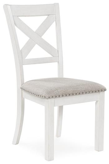 Ashley Furniture Robbinsdale dining package featuring a casual seating set with a table and chairs in a modern, stylish design.
