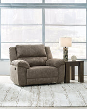 Ashley Furniture Laresview oversized recliner with plush fabric and wide cushioned seat, perfect for relaxing in style.