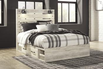 Ashley Furniture Cambeck bed with four spacious storage drawers, showcasing a stylish and functional bedroom centerpiece.