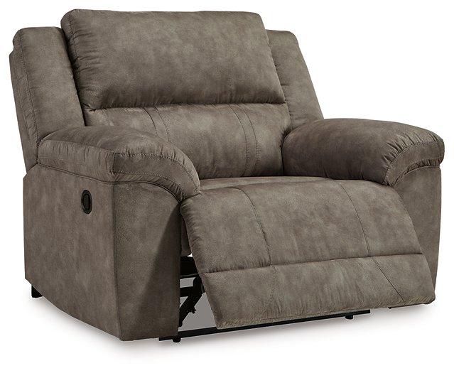 Large beige Ashley Furniture Laresview oversized recliner with plush cushions and wide armrests for comfortable seating.