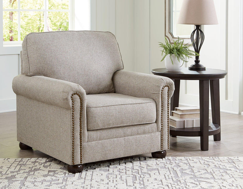 Ashley Gaelon living room set with sofa and armchair in a modern fabric design, arranged in a cozy living space.