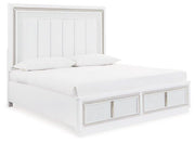 Ashley Furniture Chalanna upholstered storage bed with fabric headboard and built-in storage drawers in a modern bedroom setting.