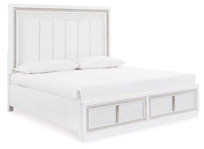 Ashley Furniture Chalanna upholstered storage bed with fabric headboard and built-in storage drawers in a modern bedroom setting.