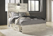 Ashley Furniture Cambeck bed with four storage drawers, featuring a sturdy frame and spacious under-bed storage.