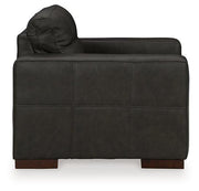 Ashley Furniture Luigi oversized chair with plush upholstery and wide armrests, perfect for comfortable seating in living rooms.
