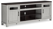 Ashley Darborn 88-inch TV stand with electric fireplace, featuring modern wood finish and storage cabinets.