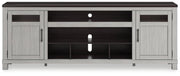 Ashley Darborn 88-inch TV stand with electric fireplace, wood finish, and storage cabinets in a modern living room setup.