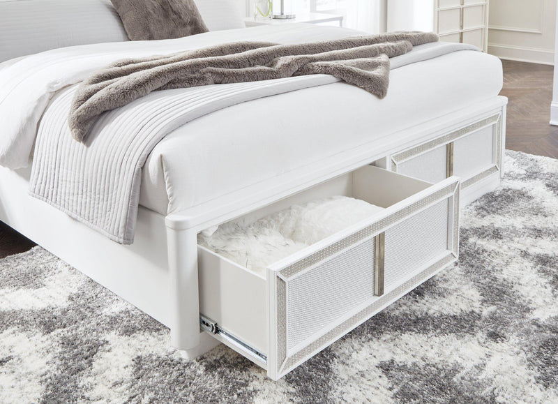 Ashley Furniture Chalanna upholstered storage bed with a padded headboard and built-in storage drawers in a modern bedroom setting