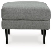 Ashley Hazela living room set featuring a sofa, loveseat, and coffee table in a modern design with neutral fabric upholstery.