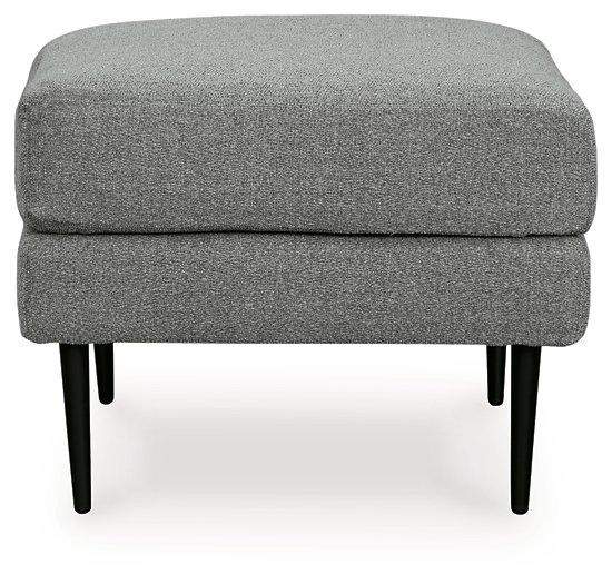 Ashley Hazela living room set featuring a sofa, loveseat, and coffee table in a modern design with neutral fabric upholstery.