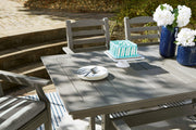 Outdoor dining set with a rectangular table and four chairs by Ashley Furniture, perfect for outdoor gatherings.