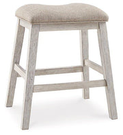 Ashley Furniture Skempton counter height dining set with barstools, featuring wooden seats and sleek metal frames.