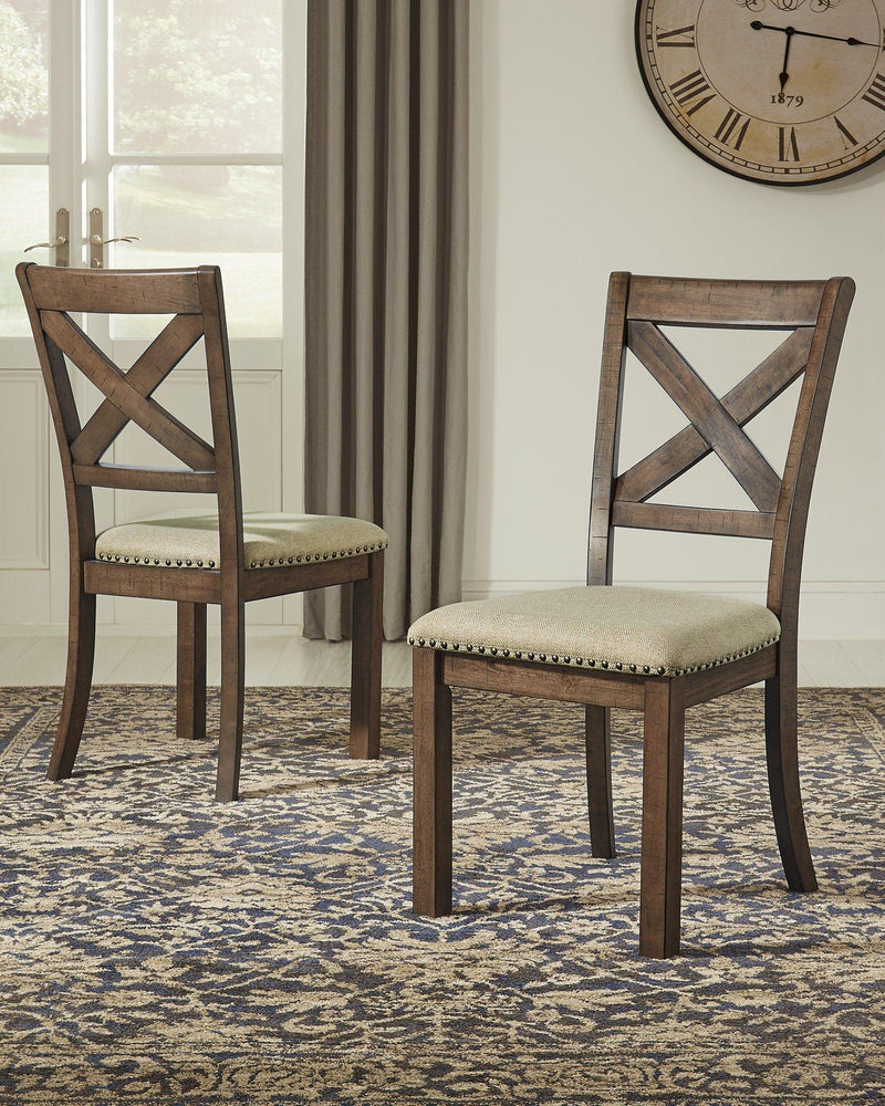 Ashley Furniture Moriville dining chair with upholstered seat and wooden legs, featuring a classic design.
