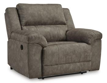 Ashley Furniture Laresview Oversized Recliner with plush fabric and padded armrests, shown in a cozy living room setting.