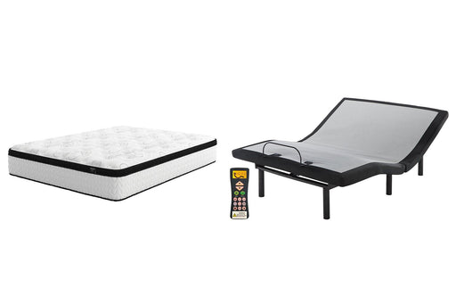 Ashley Furniture Chime 12-inch California King hybrid mattress set with bed frame and bedding in a modern bedroom scene.