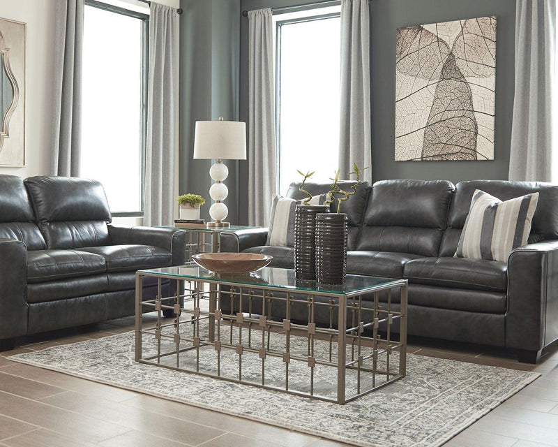 Ashley Furniture South 8' x 10' rug with intricate patterns in neutral tones, showcasing a soft and textured surface.
