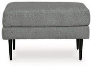 Ashley Hazela Living Room Set featuring a plush sofa and matching armchair with neutral fabric and modern design.