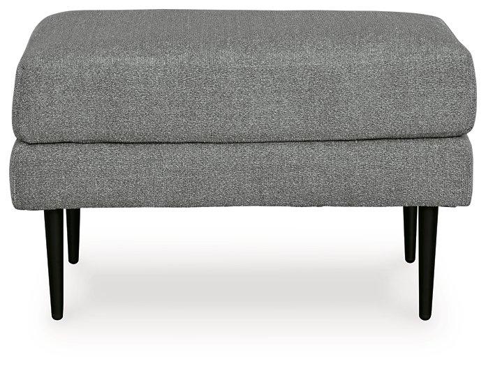 Ashley Hazela Living Room Set featuring a plush sofa and matching armchair with neutral fabric and modern design.