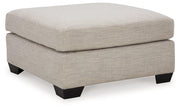 Ashley Furniture Mahoney oversized accent ottoman with plush fabric and tufted top, perfect for living room decor.