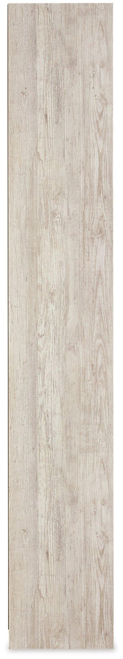 Ashley Furniture Willowton Pier media tower with open shelving and storage compartments, in a warm wood finish.