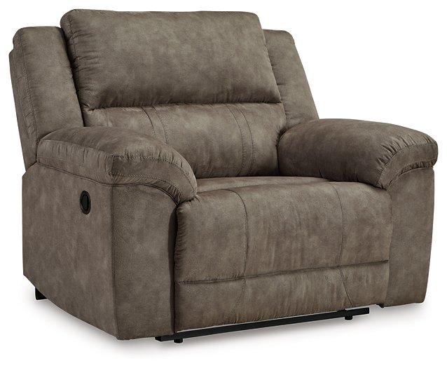 Ashley Furniture Laresview oversized recliner in beige fabric with plush cushioning and wide armrests.