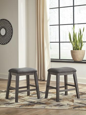 Ashley Furniture Caitbrook counter height upholstered bar stool with cushioned seat and wooden legs, ideal for kitchen or bar area.