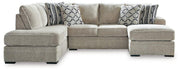 Ashley Furniture Calnita living room set with sofa, loveseat, and armchair in a modern fabric and wood finish.