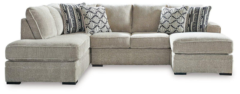 Ashley Furniture Calnita living room set with sofa, loveseat, and armchair in a modern fabric and wood finish.