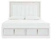 Upholstered storage bed by Ashley Furniture with a plush headboard and built-in storage drawers in a modern bedroom setting.