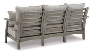 Outdoor Ashley Furniture Visola sofa and loveseat set with coffee table, featuring weather-resistant cushions and modern design.