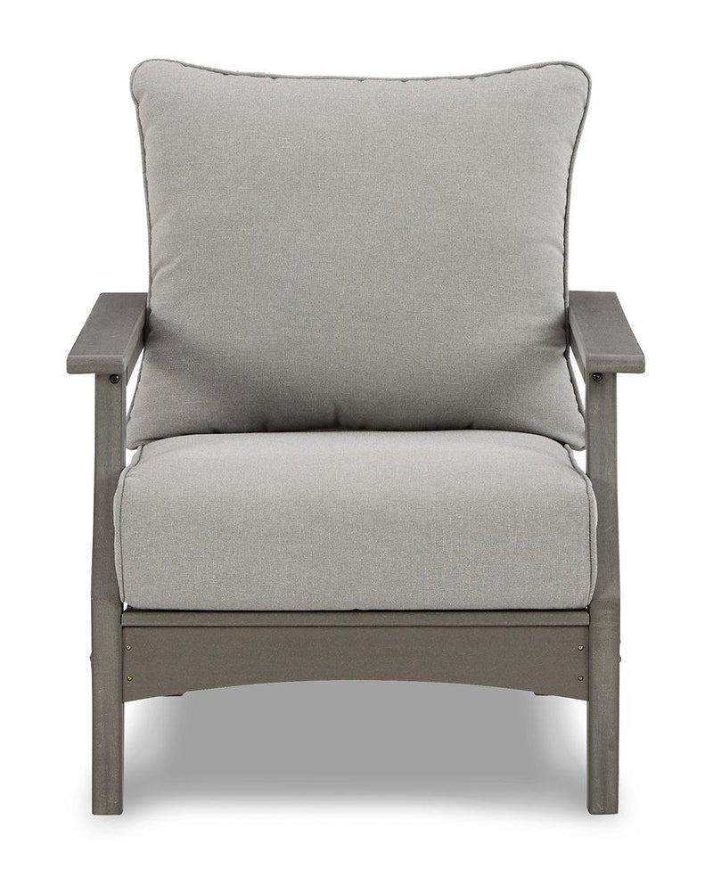 Outdoor loveseat conversation set by Ashley Furniture with cushioned seats, coffee table, and outdoor-friendly design.