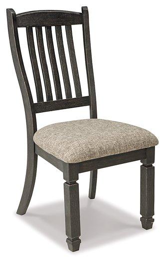 Ashley Furniture Tyler Creek dining room set featuring a wooden table and six matching chairs in a modern design.