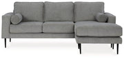 Ashley Hazela living room set featuring a sofa, loveseat, and armchair with neutral fabric and wooden legs, modern and comfortable.