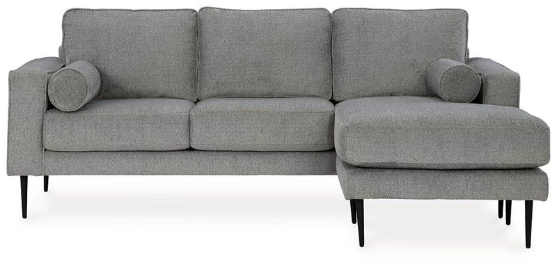 Ashley Hazela living room set featuring a sofa, loveseat, and armchair with neutral fabric and wooden legs, modern and comfortable.