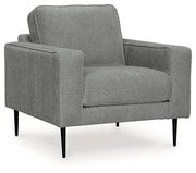 Ashley Hazela living room set with plush sofas and coordinated coffee table, showcasing modern design and neutral fabric upholstery.