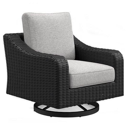 Outdoor swivel lounge chair with cushion by Ashley Furniture, featuring a stylish design perfect for outdoor relaxation.