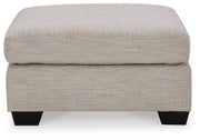 Mahoney oversized accent ottoman by Ashley Furniture featuring plush fabric and a modern design, perfect for living room decor.