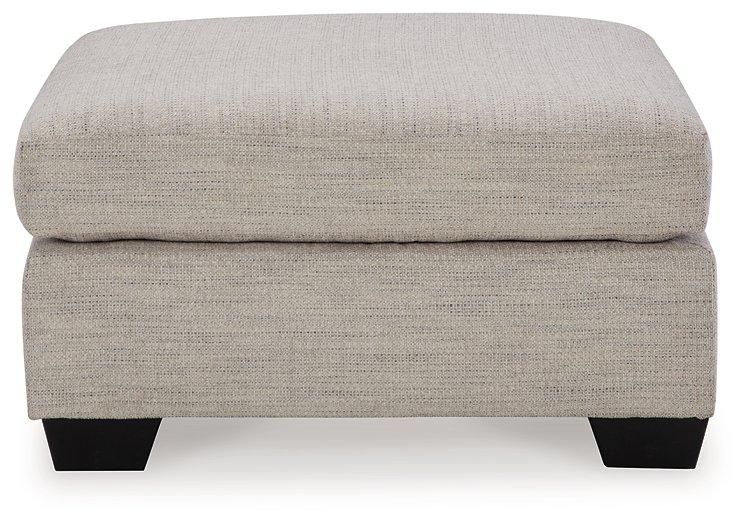 Mahoney oversized accent ottoman by Ashley Furniture featuring plush fabric and a modern design, perfect for living room decor.