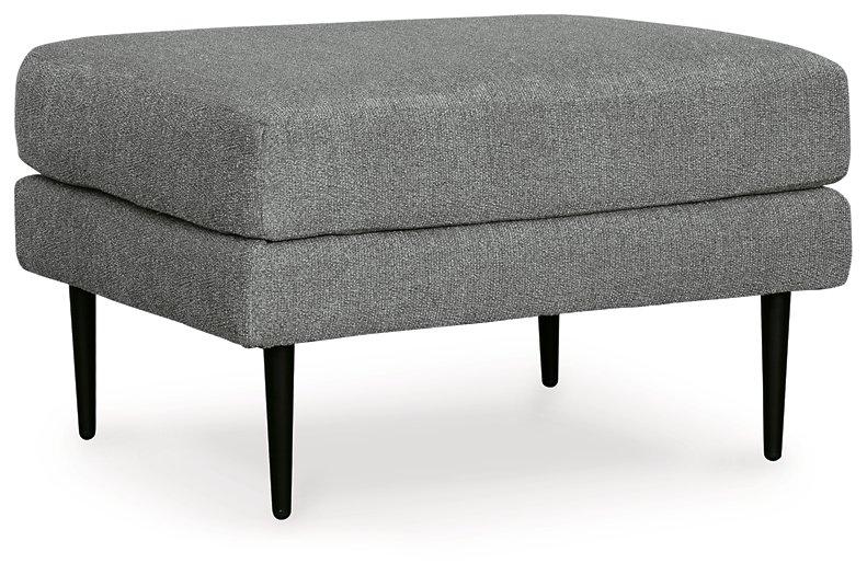 Ashley Furniture Hazela living room set with a sofa and loveseat, featuring plush cushions and contemporary upholstery.