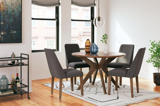 Ashley Furniture Lyncott Dining Room Set with wooden table and six matching chairs in a modern dining space.
