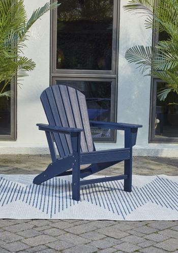 Outdoor table set from Ashley Furniture featuring a spacious table and matching chairs in a Sundown Treasure style.