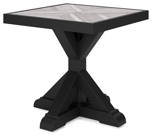 Outdoor end table from Ashley Furniture's Beachcroft collection, featuring a stylish design perfect for outdoor spaces.