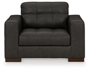 Ashley Luigi oversized chair with plush fabric and wide armrests, showcasing a modern, comfortable design.