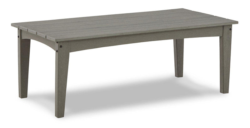 Outdoor Ashley Furniture Visola loveseat and coffee table set with cushioned seating and sturdy wooden table on a patio.