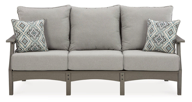 Ashley Furniture Visola outdoor sofa and loveseat set with coffee table, featuring cushioned seating and stylish outdoor design.