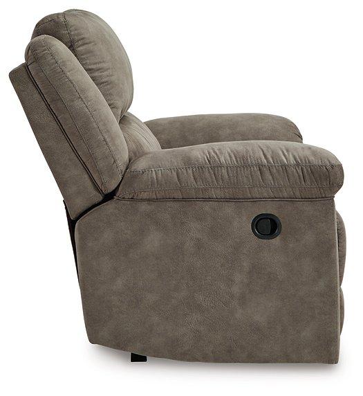 Ashley Furniture Laresview oversized recliner in plush fabric with wide armrests and cushioned back for relaxed seating.