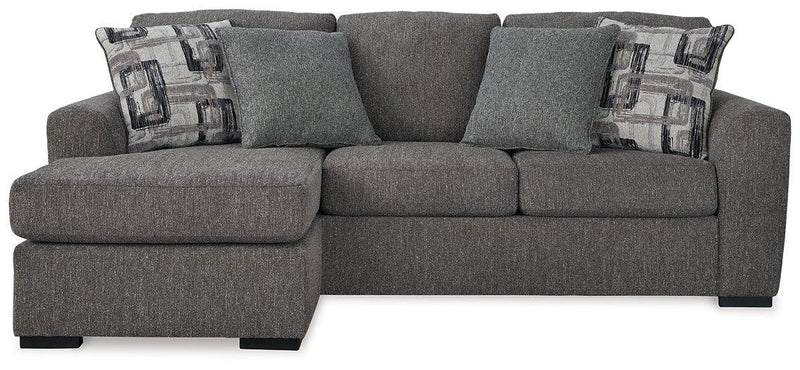 Ashley Furniture Gardiner sofa chaise showing plush fabric, wide seat, and stylish design in a modern living room setting.