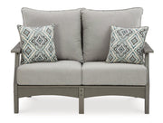 Ashley Furniture Visola outdoor loveseat conversation set with cushioned seats, outdoor coffee table, and stylish weather-resistant design.