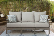 Ashley Furniture Visola outdoor seating set featuring a sofa, loveseat, and coffee table with weather-resistant cushions and modern design.