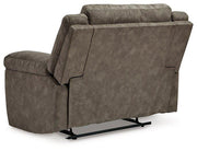 Ashley Furniture Laresview oversized recliner showing plush fabric, wide armrests, and a comfortable reclining position.
